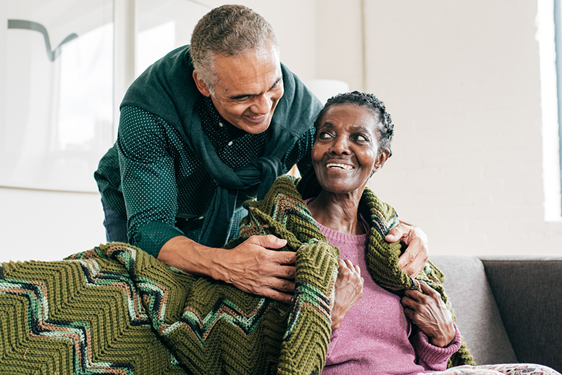 A man practices compassionate Alzheimer’s care while taking care of his aging mother.