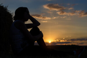 A woman deals with emotional recovery after caregiving following her loved one’s passing.